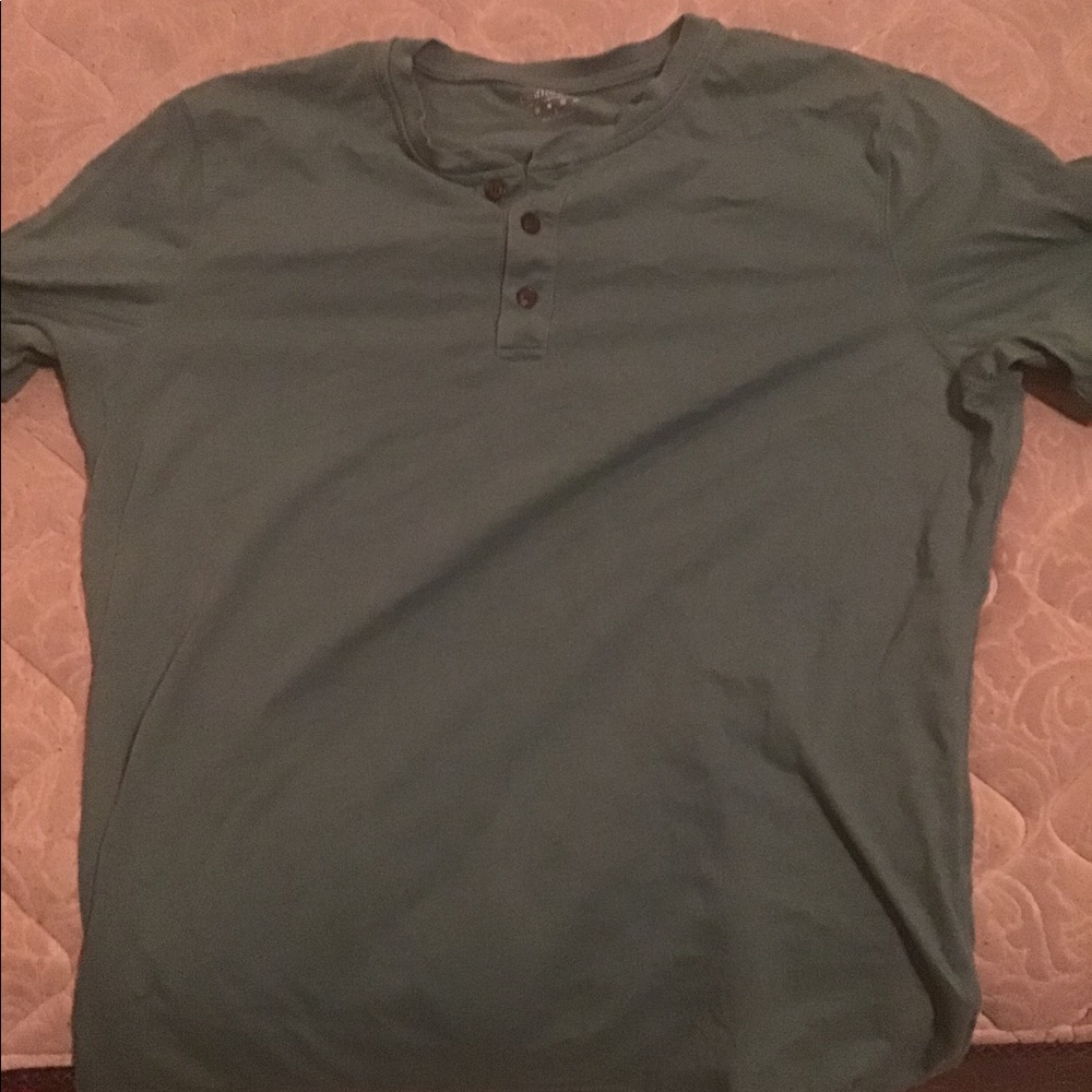 Green two button shirt